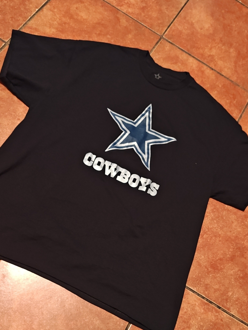 NFL Black Tee with Blue Cowboys Star Graphic